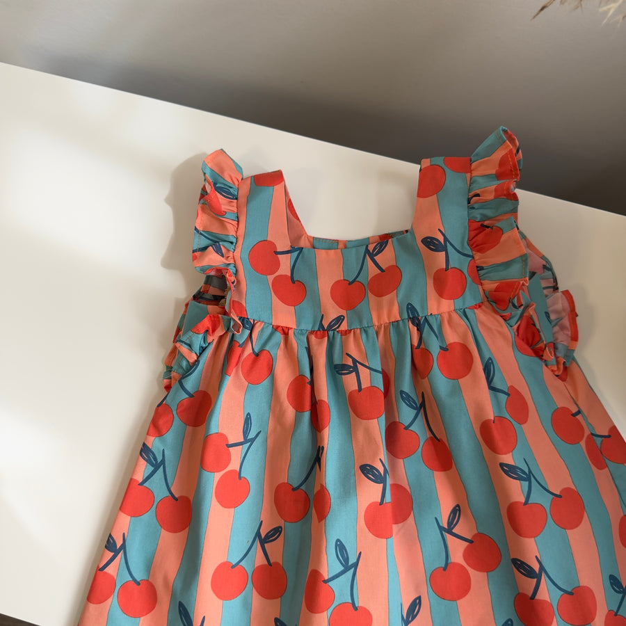 Blusa artigianale a righe con ciliegie – linea ampia e dettagli curati
