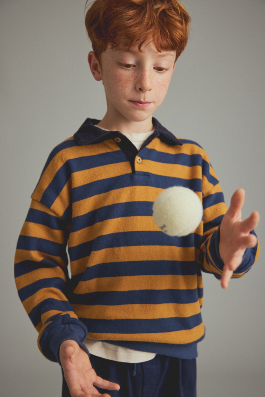 Polo in maglia morbida a righe