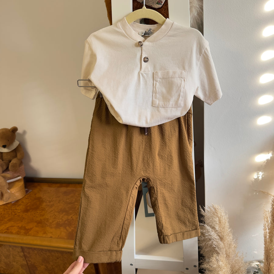Serafino color avorio con bottoni a vista e taschino – Essenziale e versatile
