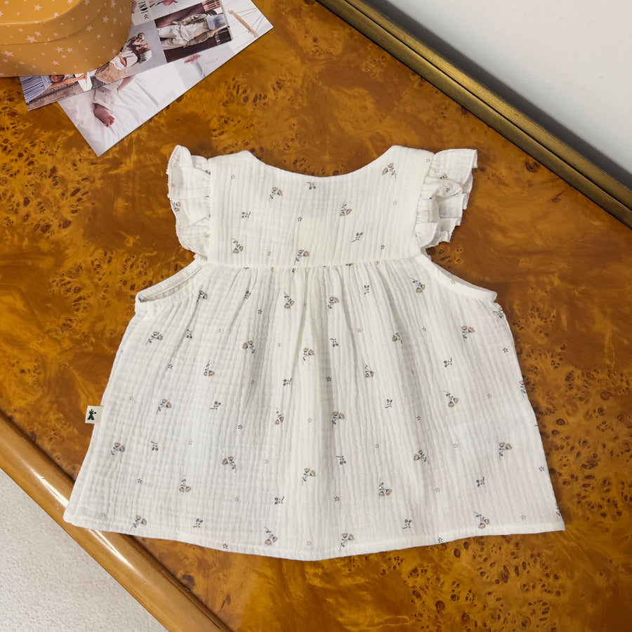 Blusa in mussolina di cotone con fiorellini – romantica, leggera e versatile