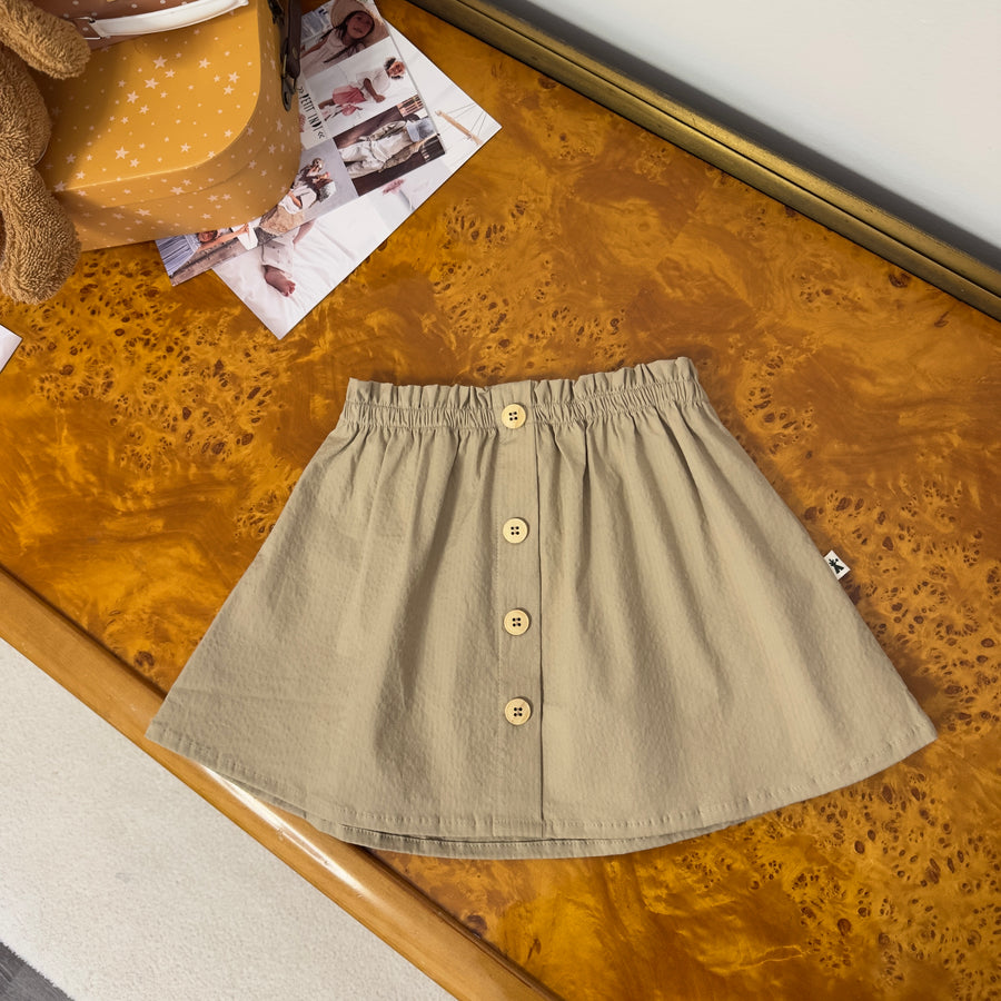 Gonna in sersucker con bottoncini in legno e vita elasticizzata – versatile e confortevole