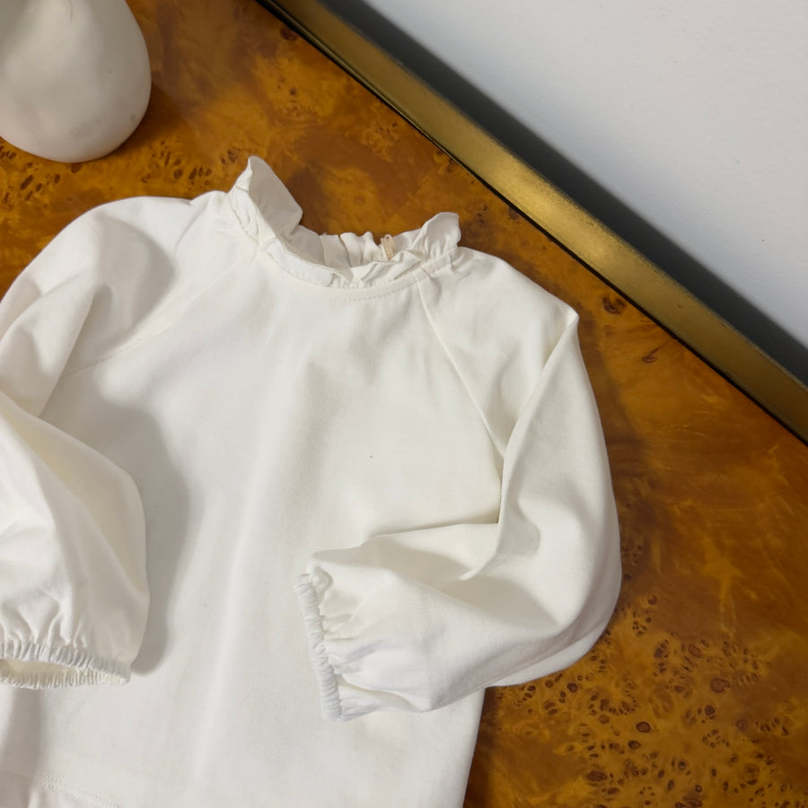 Blusa con il collo arricciato latte