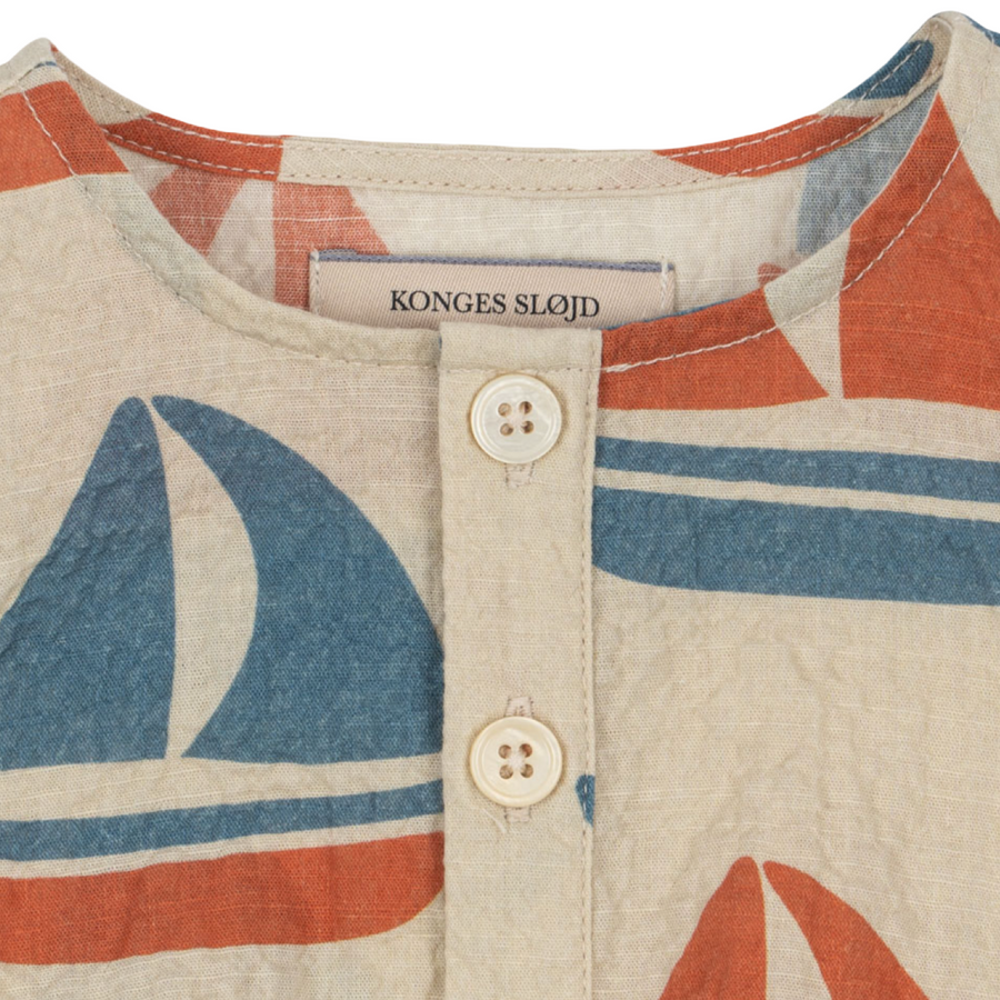 Elliot Romper – Pagliaccetto Fresco e Versatile con Bottoncini Frontali