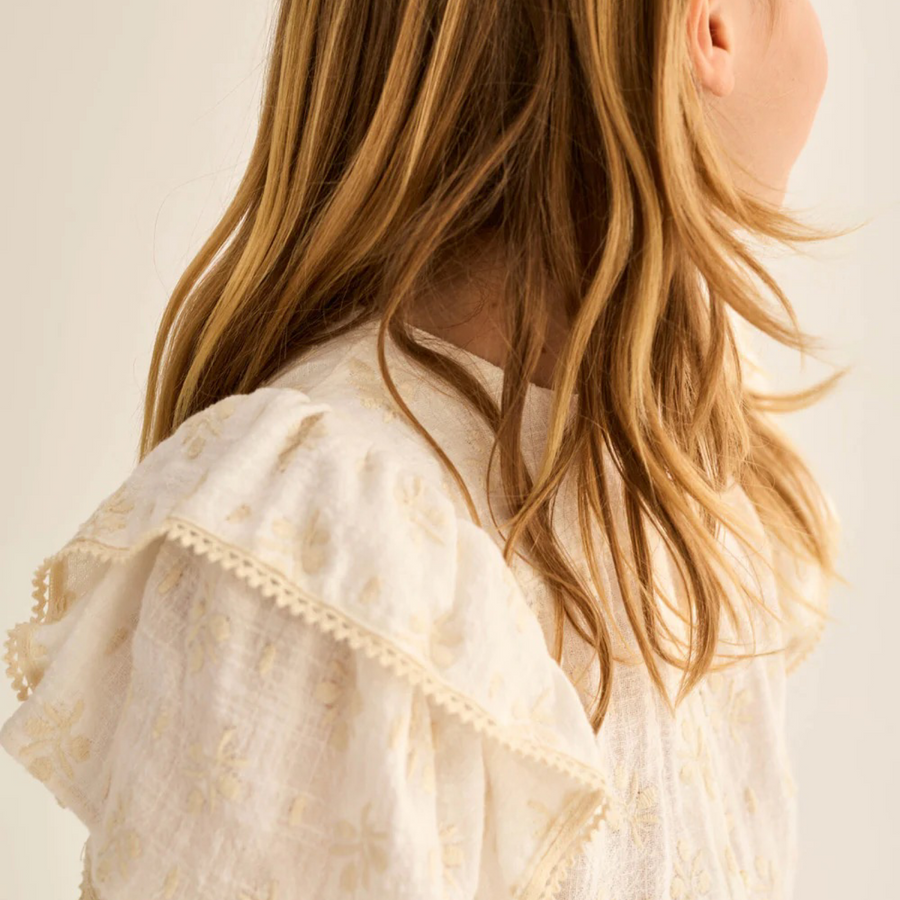 Blusa Tansy bambina in garza di cotone biologico con ricami floreali