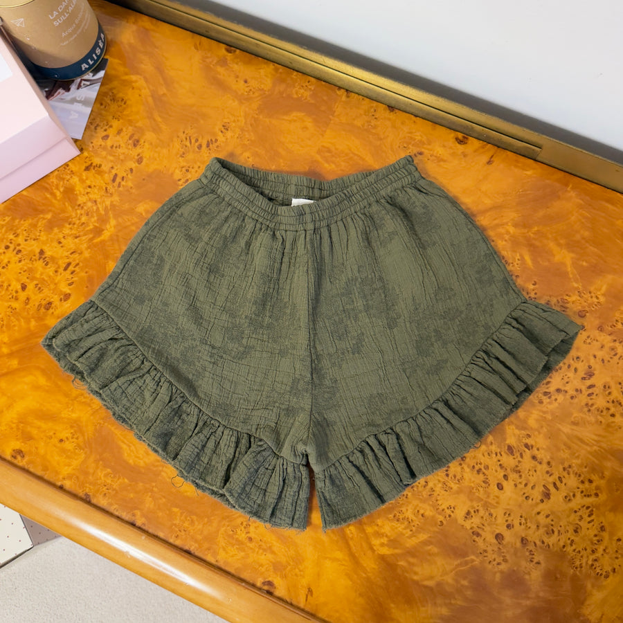 Pantaloncini in mussola di cotone foresta  con fiori tono su tono e ruches