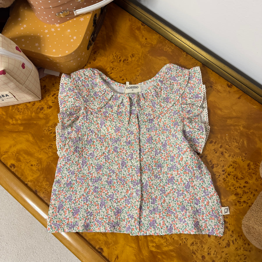 Blusa in cotone leggero con stampa floreale e maniche a volant