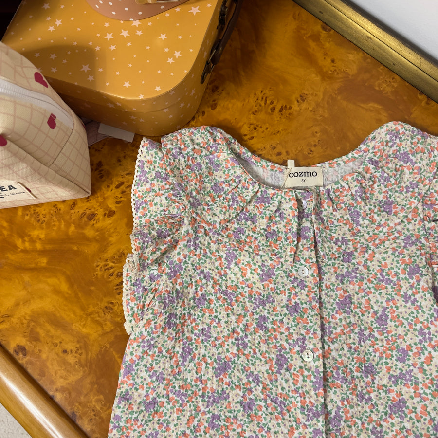 Blusa in cotone leggero con stampa floreale e maniche a volant