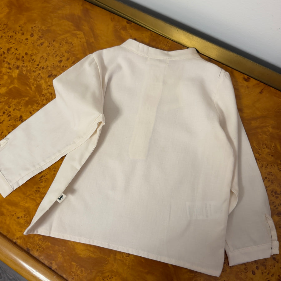 Camicia polo latte