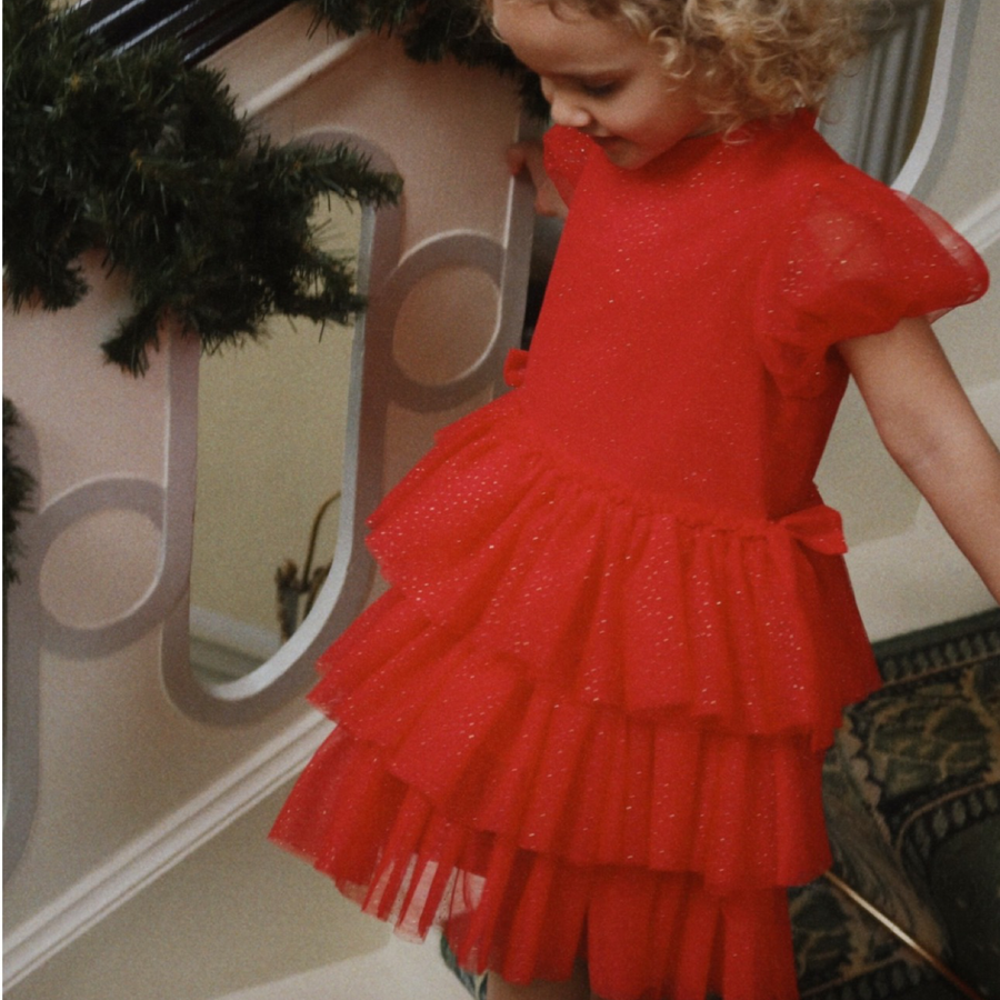 Abito in tulle rosso brillante con sottoveste in cotone organico