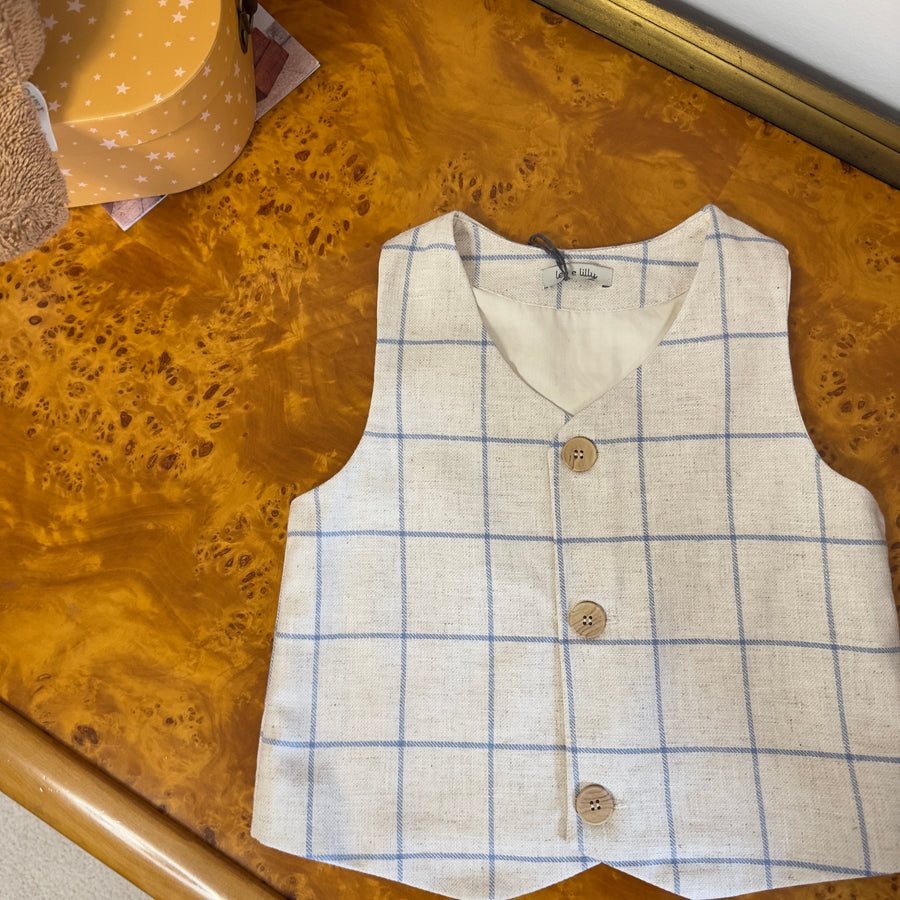 Gilet beige con quadri azzurri –elegante e versatile